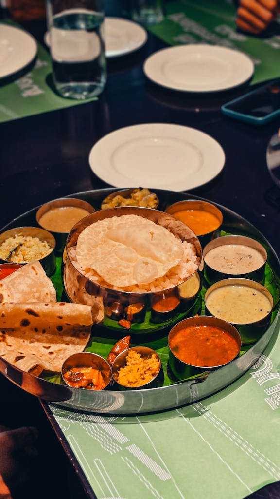 Delicious Indian thali showcased with assorted dishes, perfect for showcasing traditional Indian cuisine.